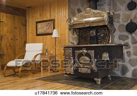 Antique Brass Bed And Dresser In An Upstairs Bedroom In A 1978