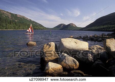 Acadia National Park, lake, pond, Acadia, sailboat, Maine, Scenic view of sailboat on Jordan Pond in Acadia Nat'l Park in the state of Maine. View Large Photo Image Stock Photo - Acadia National Park, lake, pond, Acadia, sailboat, Maine, Scenic view of sailboat on Jordan Pond in Acadia Nat'l Park in the state of Maine.. Fotosearch