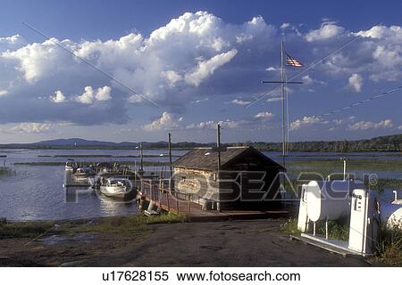 Adirondack Park, New York, Adirondacks, Boats docked at Port MacDonald Dock on Tupper Lake in Moody in the state of New York. View Large Photo Image Stock Photography - Adirondack Park, New York, Adirondacks, Boats docked at Port MacDonald Dock on Tupper Lake in Moody in the state of New York. . Fotosearch