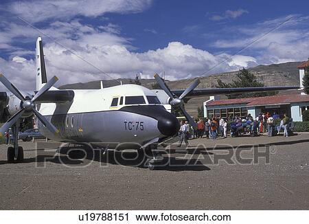 airplane, propeller, Patagonia, Argentina, Calafate, airport terminal, Passengers boarding a propeller plane at the Lago Argentina Airport in El Calafate. View Large Photo Image Stock Image - airplane, propeller, Patagonia, Argentina, Calafate, airport terminal, Passengers boarding a propeller plane at the Lago Argentina Airport in El Calafate. . Fotosearch
