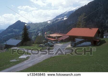 alps, Switzerland, Vaud, Europe, Chalets perched on the steep hills that lead up to the alpine mountains in Le Sepey in the Canton of Vaud. View Large Photo Image Stock Photography - alps, Switzerland, Vaud, Europe, Chalets perched on the steep hills that lead up to the alpine mountains in Le Sepey in the Canton of Vaud. . Fotosearch