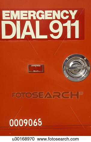 Stock Image -  Ambulance, Rescue, Help, emergency, Dial 911 emergency on the side of a red [amubulance, fire truck].. Fotosearch