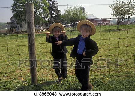 amish, Amish Country, boys, Lancaster County, Pennsylvania, Two Amish young boys wearing straw hats stand by a fence on an Amish farm in Pennsylvania Dutch Country in Lancaster County in the state of Pennsylvania. View Large Photo Image Stock Photo - amish, Amish Country, boys, Lancaster County, Pennsylvania, Two Amish young boys wearing straw hats stand by a fence on an Amish farm in Pennsylvania Dutch Country in Lancaster County in the state of Pennsylvania.. Fotosearch