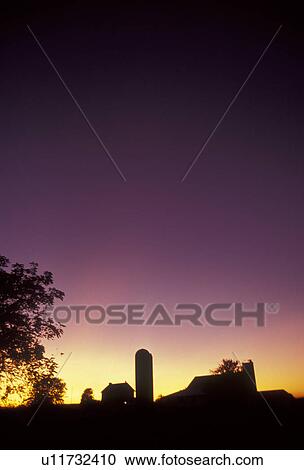 Stock Image -  amish, farm, Amish country, Lancaster County, silhouette, Pennsylvania, Pennsylvania Dutch Country, A silhouette of an Amish farm at sunset in Lancaster in the state of Pennsylvania. . Fotosearch