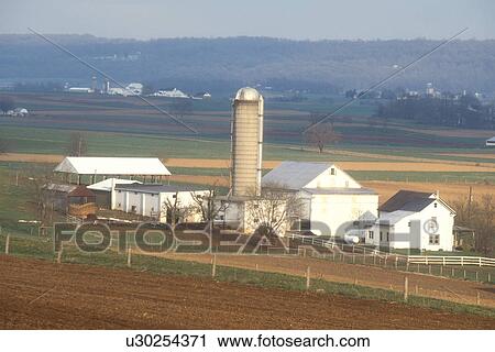 Stock Image -  Amish, Pennsylvania, farm, Lancaster County, An Amish farm in scenic Pennsylvania Dutch Country.. Fotosearch