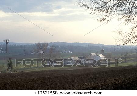 Stock Photo -  Amish, Pennsylvania, Lancaster County, farmland, plowed fields in scenic Amish farmland in picturesque Pennsylvania Dutch Country.. Fotosearch