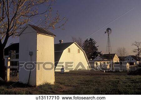 Stock Image -  amish telephone booth, farm Amish Country, Pennsylvania Dutch Country, Pennsylvania, Amish telephone booth next to an Amish farm in Lancaster County in the state of Pennsylvania.. Fotosearch