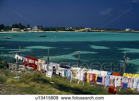 Stock Photo -  Anguilla, Caribbean, Caribbean Islands, Laundry day near the beach on Island Harbor on the island of Anguilla (a british territory).. Fotosearch