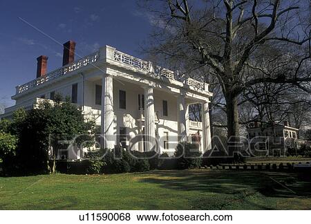 Stock Photo -  antebellum, Madison, mansion, Georgia, An Antebellum house with stately white columns in the Historic District of Madison in the state of Georgia.. Fotosearch