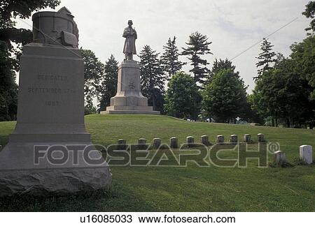Stock Image -  Antietam, cemetery, Antietam National Battlefield, civil war, Maryland, Gravesites and monuments at the Antietam National Cemetery at Antietam Nat'l Battlefield in the state of Maryland. . Fotosearch