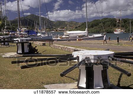 Stock Photo -  Antigua, Caribbean, Caribbean Islands, Pier at Historic Nelson's Dockyard National Park in English Harbour on the island of Antigua (a British Commonwealth member). . Fotosearch