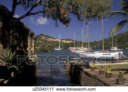 Antigua, Caribbean, Caribbean Islands, Sailboats at Historic Nelson's Dockyard in English Harbour on the island of Antigua (a British Commonwealth member). View Large Photo Image Stock Photo - Antigua, Caribbean, Caribbean Islands, Sailboats at Historic Nelson's Dockyard in English Harbour on the island of Antigua (a British Commonwealth member). . Fotosearch