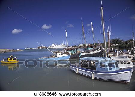 Stock Photograph -  Antigua, Caribbean, St. John's, Caribbean Islands, Fishing boats on St. John's Harbor in St. John's the capital of the island of Antigua (a British Commonwealth member).. Fotosearch