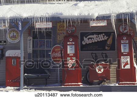 antique gas station, Vermont, VT, Icicles hang from a gas station with antique gas pumps in the snow in winter in the town of Orange. View Large Photo Image Stock Photo - antique gas station, Vermont, VT, Icicles hang from a gas station with antique gas pumps in the snow in winter in the town of Orange.. Fotosearch