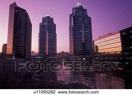 Stock Image -  Atlanta, Georgia, Dunwoody, Scenic view of the Concourse Buildings at sunset in Atlanta in the state of Georgia.. Fotosearch