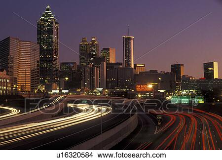 Atlanta, skyline, downtown, Georgia, Atlanta's downtown skyline and Downtown Connector Interstate I-75/85 at sunset from North Avenue in the state of Georgia. View Large Photo Image Picture - Atlanta, skyline, downtown, Georgia, Atlanta's downtown skyline and Downtown Connector Interstate I-75/85 at sunset from North Avenue in the state of Georgia.. Fotosearch