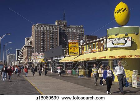 Atlantic City, New Jersey, boardwalk, People walking along the Boardwalk in Atlantic City in the state of New Jersey. View Large Photo Image Stock Photo - Atlantic City, New Jersey, boardwalk, People walking along the Boardwalk in Atlantic City in the state of New Jersey.. Fotosearch