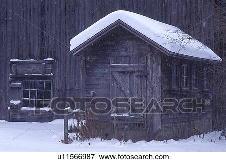 barn, winter, Vermont, A rustic wooden barn is covered with snow in Underhill in Chittenden County in the state of Vermont. View Large Photo Image Stock Photo - barn, winter, Vermont, A rustic wooden barn is covered with snow in Underhill in Chittenden County in the state of Vermont.. Fotosearch