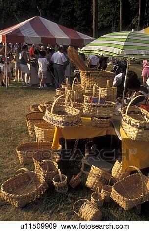 Stock Photo -  baskets, festival, Stone Mountain, Georgia's Stone Mountain Park, Atlanta, Georgia, Baskets for sale displayed at the 25th Yellow Daisy Festival at Georgia's Stone Mt. Park near Atlanta in the state of Georgia. . Fotosearch