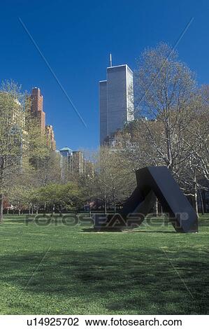 Stock Image -  Battery Park, New York City, Manhattan, New York, N. Y. C Lower Manhattan skyline and Battery Park in the spring in New York City, New York.. Fotosearch