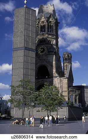 Picture -  Berlin, church, Germany, Europe, Brandenburg Region, The Kaiser-Wilhelm-Gedachtnis-Kirche, the shattered memorial church, stands as a landmark in the capital city of Berlin showing the old ruins and the new modern architecture. A remembrance of World War. Fotosearch