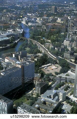 Stock Photo -  Berlin, Germany, Europe, Aerial view of the city of former East Berlin. Berlin the capital city of Germany from the television tower (fernsehturm). It is Berlin's tallest structure at 365 metres (1198 feet). . Fotosearch