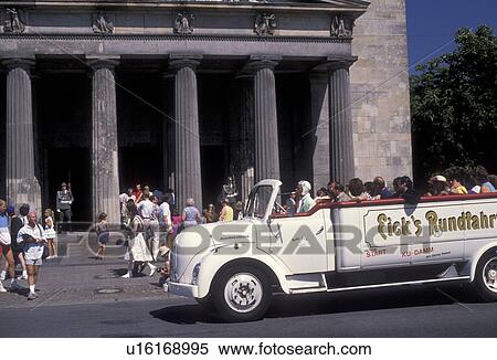 Berlin, Germany, Europe, Tour bus driving tourists by the Guard-House of former East Berlin. Berlin the capital city of Germany. View Large Photo Image Stock Photography - Berlin, Germany, Europe, Tour bus driving tourists by the Guard-House of former East Berlin. Berlin the capital city of Germany. . Fotosearch