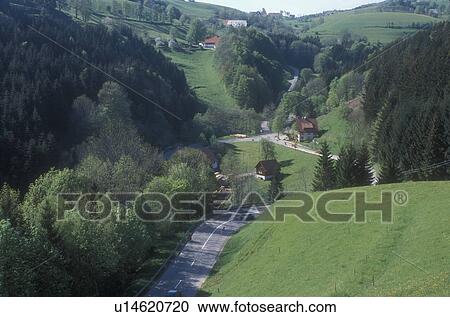 Black Forest, Germany, Europe, A road winds through the scenic rolling hills and countryside of the Black Forest Region in St. Peter, Germany in the spring. View Large Photo Image Stock Image - Black Forest, Germany, Europe, A road winds through the scenic rolling hills and countryside of the Black Forest Region in St. Peter, Germany in the spring.. Fotosearch