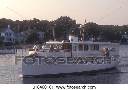 boat, Connecticut, Mystic, A yacht cruises along the Mystic River in Mystic, Connecticut. View Large Photo Image Stock Image - boat, Connecticut, Mystic, A yacht cruises along the Mystic River in Mystic, Connecticut. . Fotosearch