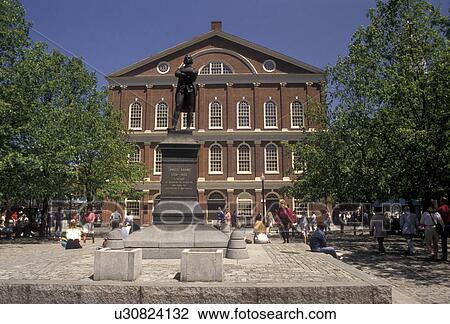 Stock Image -  Boston, Marketplace, Faneuil Hall, Quincy Market, Massachusetts, Plaza and statue of Sam Adams at Faneuil Hall in downtown Boston in the state of Massachusetts. . Fotosearch