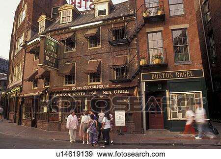 Boston, Massachusetts, Shops and restaurants along the street in Marketplace in downtown Boston in the state of Massachusetts.,  View Large Photo Image Stock Photo -  Boston, Massachusetts, Shops and restaurants along the street in Marketplace in downtown Boston in the state of Massachusetts., . Fotosearch