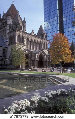 Boston, Massachusetts, The Trinity Church stands in front of a modern high-rise building at Copley Square View Large Photo Image Stock Photo - Boston, Massachusetts, The Trinity Church stands in front of a modern high-rise building at Copley Square . Fotosearch