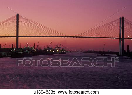 Stock Photography -  bridge, Savannah, Georgia, Scenic view of the Talmadge Bridge crossing the Savannah River at sunset in Savannah in the state of Georgia. . Fotosearch