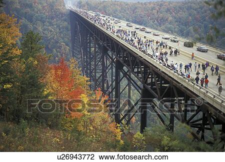 bridge, West Virginia, People on New River Gorge Bridge (a steel-arch span bridge) in the autumn in Fayetteville in the state of West Virginia., View Large Photo Image Stock Image - bridge, West Virginia, People on New River Gorge Bridge (a steel-arch span bridge) in the autumn in Fayetteville in the state of West Virginia., . Fotosearch
