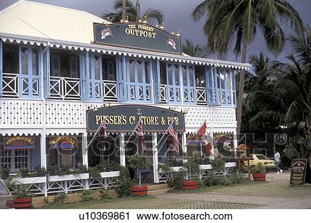 Stock Image -  British Virgin Islands, Tortola, Caribbean, Virgin Islands, BVI, B. V. I Pusser's Store and Pub in Road Town on the island of Tortola on the British Virgin Islands.. Fotosearch