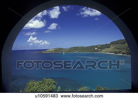 British Virgin Islands, Tortola, Caribbean, Virgin Islands, B. V. I BVI, Picturesque view of Brewer's Bay looking through an arch on the island of Tortola on the British Virgin Islands. View Large Photo Image Stock Image - British Virgin Islands, Tortola, Caribbean, Virgin Islands, B. V. I BVI, Picturesque view of Brewer's Bay looking through an arch on the island of Tortola on the British Virgin Islands.. Fotosearch