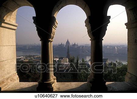 Budapest, Hungary, Europe, Scenic view of the Danube (Donau) River and the capital city of Budapest at night through the windows of the Fisherman's Bastion. View Large Photo Image Stock Photo - Budapest, Hungary, Europe, Scenic view of the Danube (Donau) River and the capital city of Budapest at night through the windows of the Fisherman's Bastion. . Fotosearch