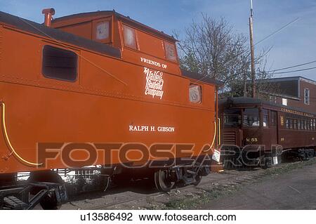 Stock Image -  caboose, train, Connecticut, A red caboose is displayed at the Valley Railroad Company in Essex, Connecticut.. Fotosearch