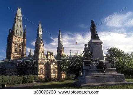 Stock Image -  Canada, Ontario, Ottawa, Monument stands besides the Parliament on Parliament Hill in Ottawa.. Fotosearch