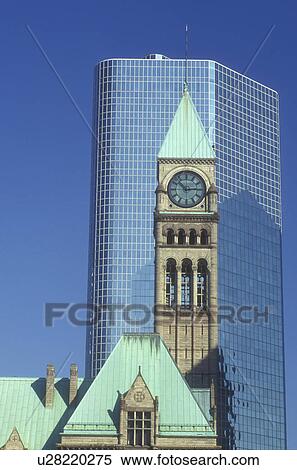 Canada, Ontario, Toronto, A modern high-rise building stands behind the clock tower of Old City Hall in downtown Toronto. View Large Photo Image Stock Photography - Canada, Ontario, Toronto, A modern high-rise building stands behind the clock tower of Old City Hall in downtown Toronto.. Fotosearch