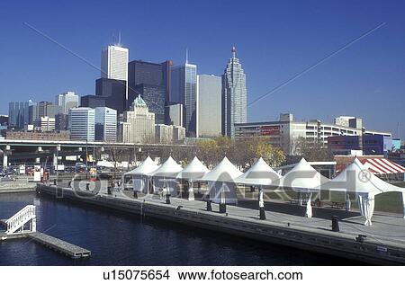 Picture -  Canada, Ontario, Toronto, Downtown skyline of Toronto from Harborfront Center in Lake Ontario. . Fotosearch