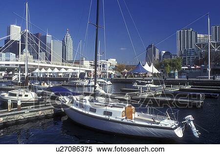Canada, Ontario, Toronto, Downtown skyline of Toronto from Harborfront Center in Lake Ontario. View Large Photo Image Stock Photography - Canada, Ontario, Toronto, Downtown skyline of Toronto from Harborfront Center in Lake Ontario. . Fotosearch