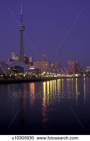 Canada, Ontario, Toronto, Skyline of downtown Toronto and CN Tower reflect in the waters of Lake Ontario in the evening. View Large Photo Image Stock Image - Canada, Ontario, Toronto, Skyline of downtown Toronto and CN Tower reflect in the waters of Lake Ontario in the evening.. Fotosearch