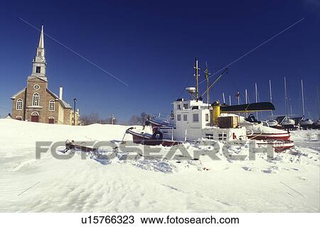 Canada, Quebec, Boats in the frozen St. Lawrence River (Fleuve Saint-Laurent) on Ile d'Orleans., View Large Photo Image Stock Image - Canada, Quebec, Boats in the frozen St. Lawrence River (Fleuve Saint-Laurent) on Ile d'Orleans., . Fotosearch
