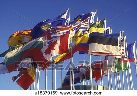 Stock Photo -  Canada, Quebec, carnaval, Flags from different countries fly at Place Desjardins during the Winter Carnival in Old Quebec City. . Fotosearch