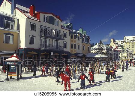 Canada, Quebec, Children getting ready for ski lessons at Tremblant Ski Resort at Mont Tremblant. The village has an Old Quebec City atmosphere View Large Photo Image Stock Photography - Canada, Quebec, Children getting ready for ski lessons at Tremblant Ski Resort at Mont Tremblant. The village has an Old Quebec City atmosphere . Fotosearch