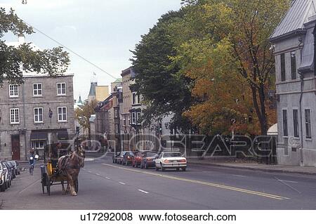 Canada, Quebec, Horse drawn carriage takes tourists along Rue St. Louis in Old Quebec City., View Large Photo Image Stock Photo - Canada, Quebec, Horse drawn carriage takes tourists along Rue St. Louis in Old Quebec City., . Fotosearch