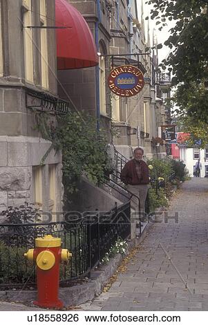 Canada, Quebec, Hotels along Rue Laporte in Old Quebec City. Red and yellow fire hydrant on corner of sidewalk View Large Photo Image Stock Photograph - Canada, Quebec, Hotels along Rue Laporte in Old Quebec City. Red and yellow fire hydrant on corner of sidewalk . Fotosearch