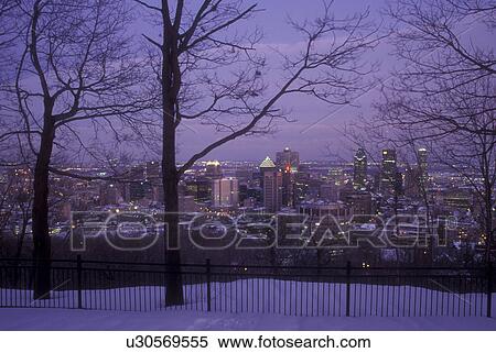 Stock Photography -  Canada, Quebec, Montreal, Aerial view of the downtown skyline of Montreal from Mont Royal in the evening.. Fotosearch