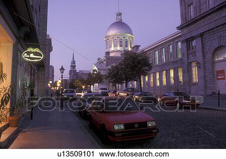 Stock Image -  Canada, Quebec, Montreal, Marche Bonsecours along Rue St. Paul at night (evening) in Vieux Montreal.. Fotosearch